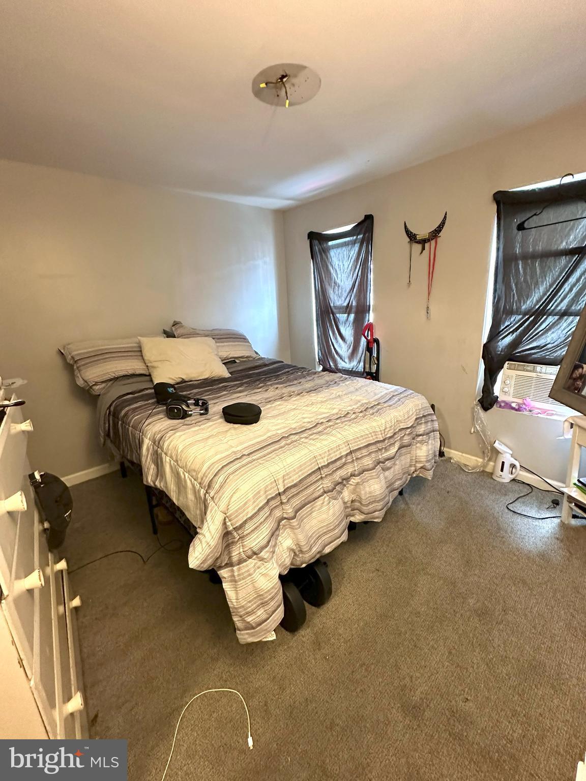 1053 Muhlenberg Street Reading, PA 19602 - Photo 9 of 10 a bedroom with bed and window