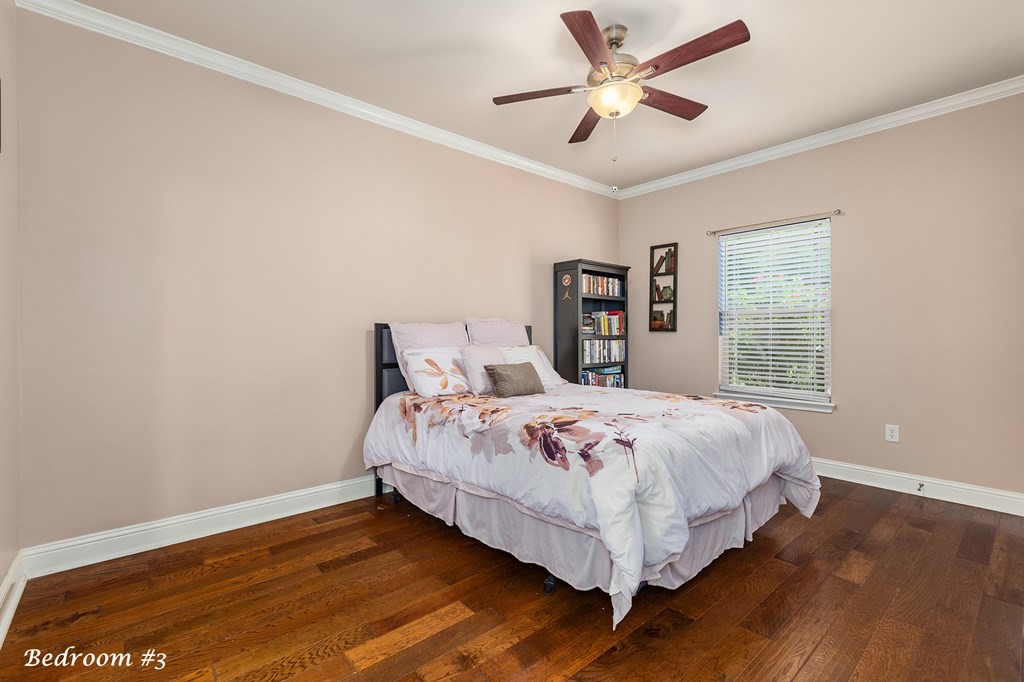 1171 Old Ewing Road Lufkin, TX 75901 - Photo 20 of 49 a bedroom with a bed and a window