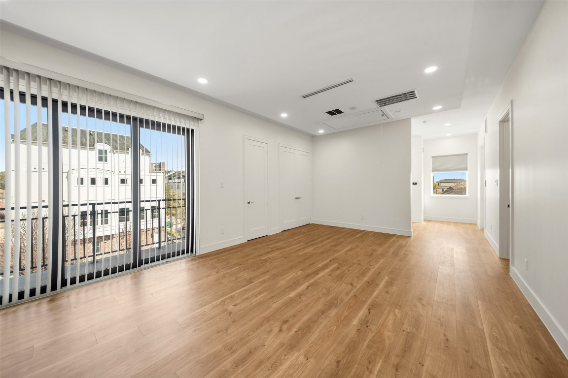 1839 Colquitt Street Houston, TX 77098 - Photo 13 of 19 a view of empty room with wooden floor