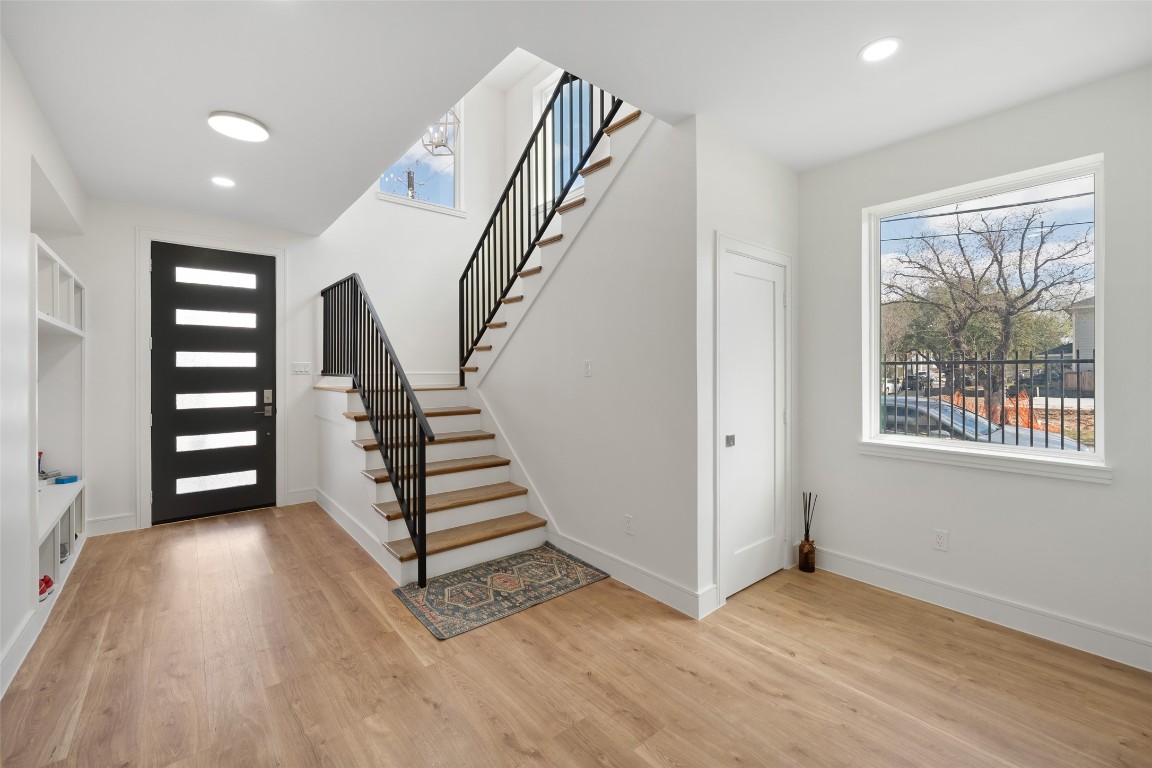 1839 Colquitt Street Houston, TX 77098 - Photo 3 of 19 a view of entryway with stairs and wooden floor
