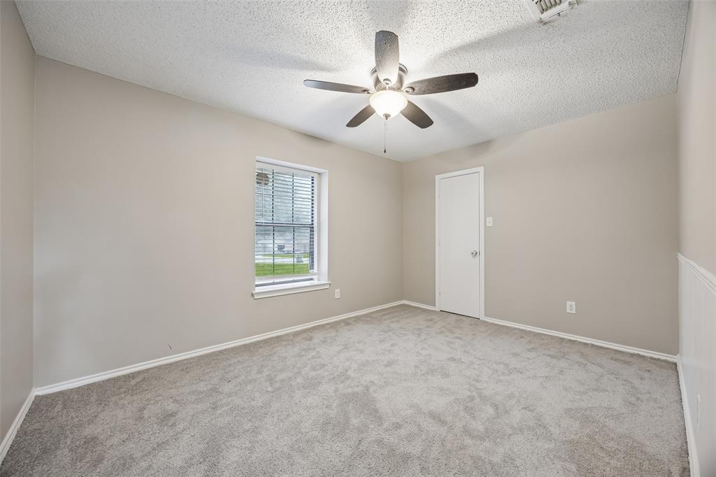 116 Timberview Court Burleson, TX 76028 - Photo 19 of 37 a view of an empty room with a window