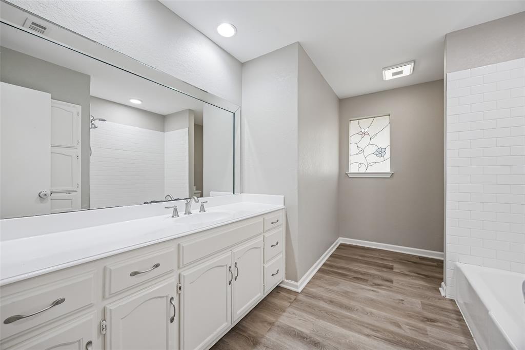 116 Timberview Court Burleson, TX 76028 - Photo 22 of 37 a bathroom with a sink and a mirror