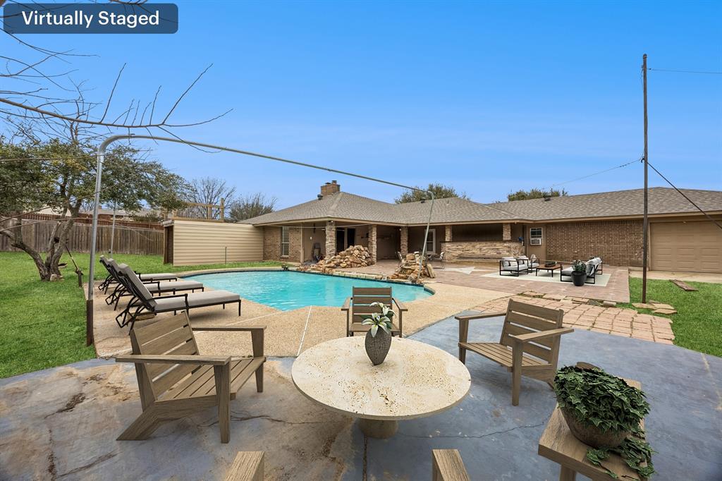 116 Timberview Court Burleson, TX 76028 - Photo 34 of 37 a view of a patio with a table and chairs