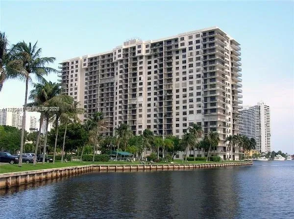 a front view of a building with lake view