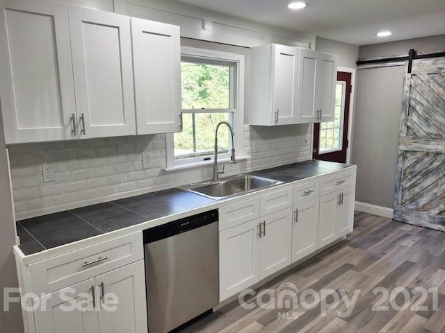 580 Coley Road Salisbury, NC 28146 - Photo 2 of 14 a kitchen with white cabinets and window