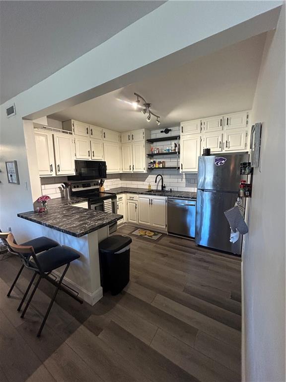 8133 Holmes Road, Unit 101 Kansas City, MO 64131 - Photo 1 of 22