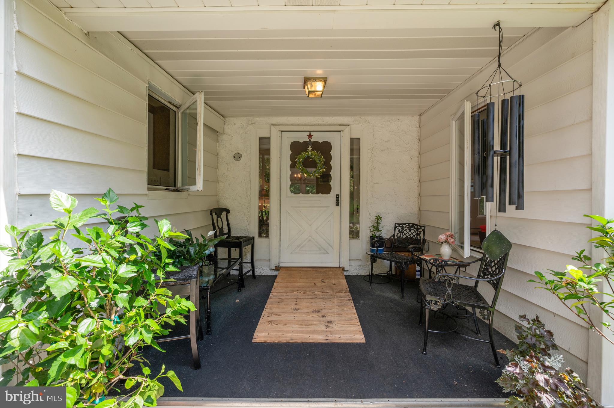 120 Diamond Rock Road Phoenixville, PA 19460 - Photo 16 of 86 a hallway with table and chairs