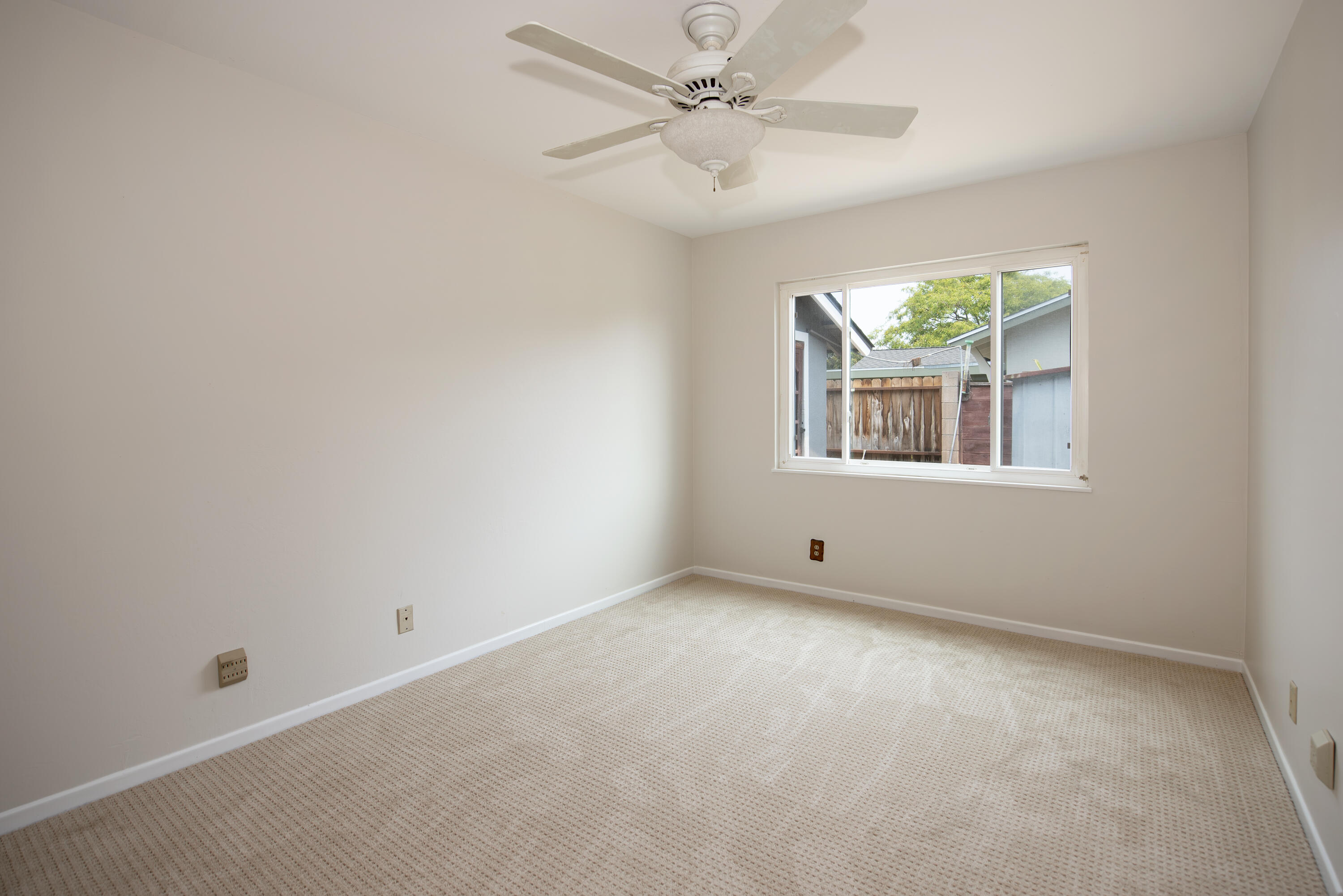 6237 Momouth Avenue Goleta, CA 93117 - Photo 14 of 20 an empty room with a window and a fan