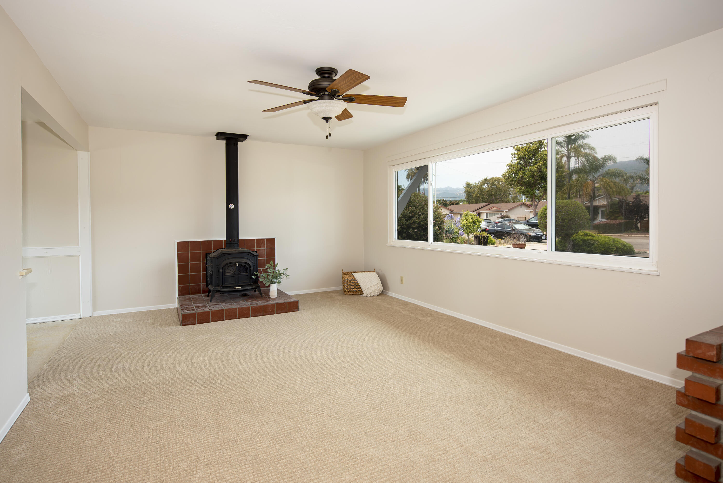 6237 Momouth Avenue Goleta, CA 93117 - Photo 3 of 20 a view of a livingroom with a ceiling fan and window