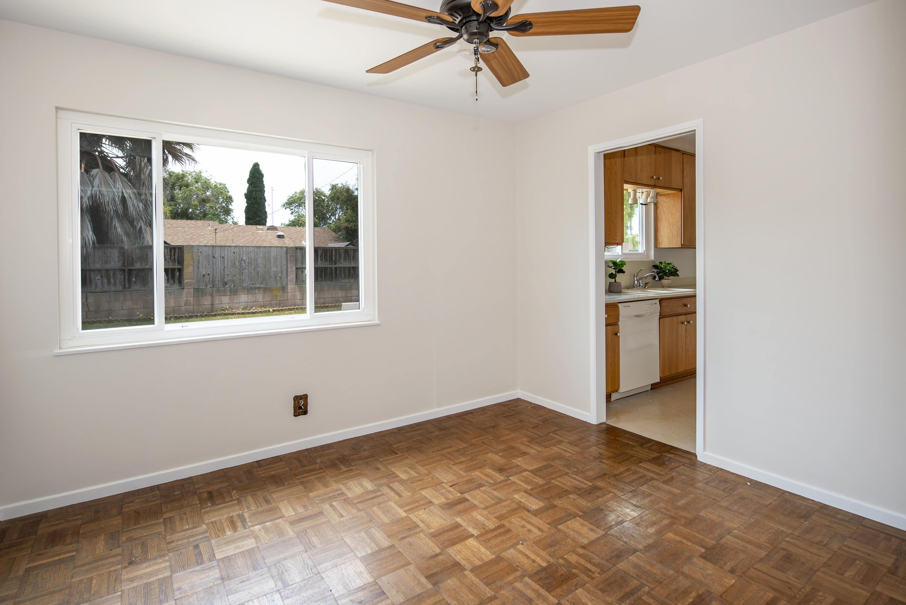 6237 Momouth Avenue Goleta, CA 93117 - Photo 9 of 20 a view of empty room with a ceiling fan and window