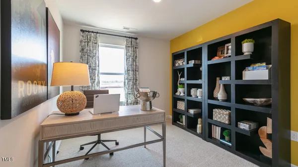 a workspace with a bookshelf