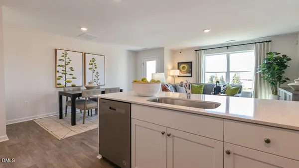 a kitchen with sink and window