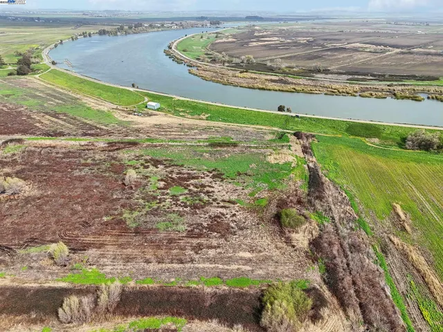 a view of a yard with an outdoor space