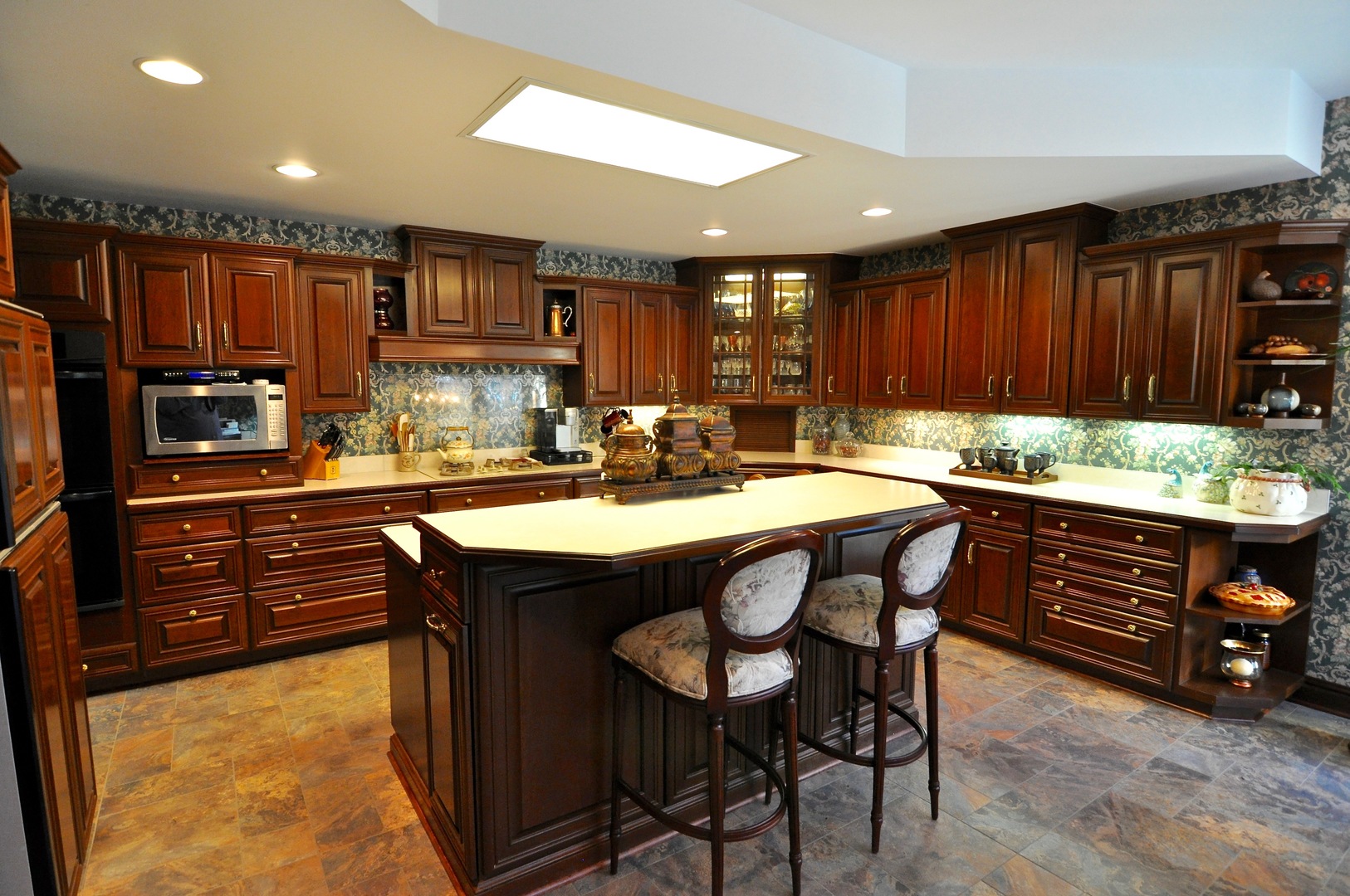 16161 Whipple Road Sycamore, IL 60178 - Photo 12 of 45 a kitchen with a table chairs sink and cabinets