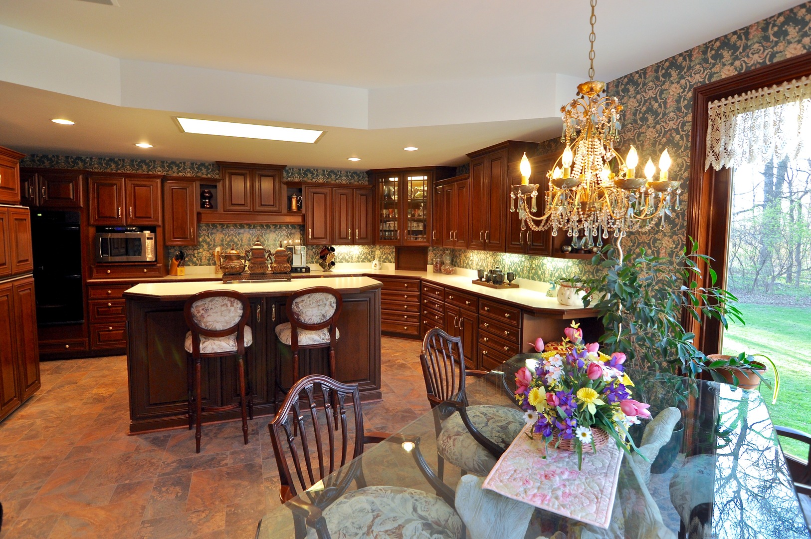 16161 Whipple Road Sycamore, IL 60178 - Photo 13 of 45 a dining hall with furniture a chandelier and kitchen view