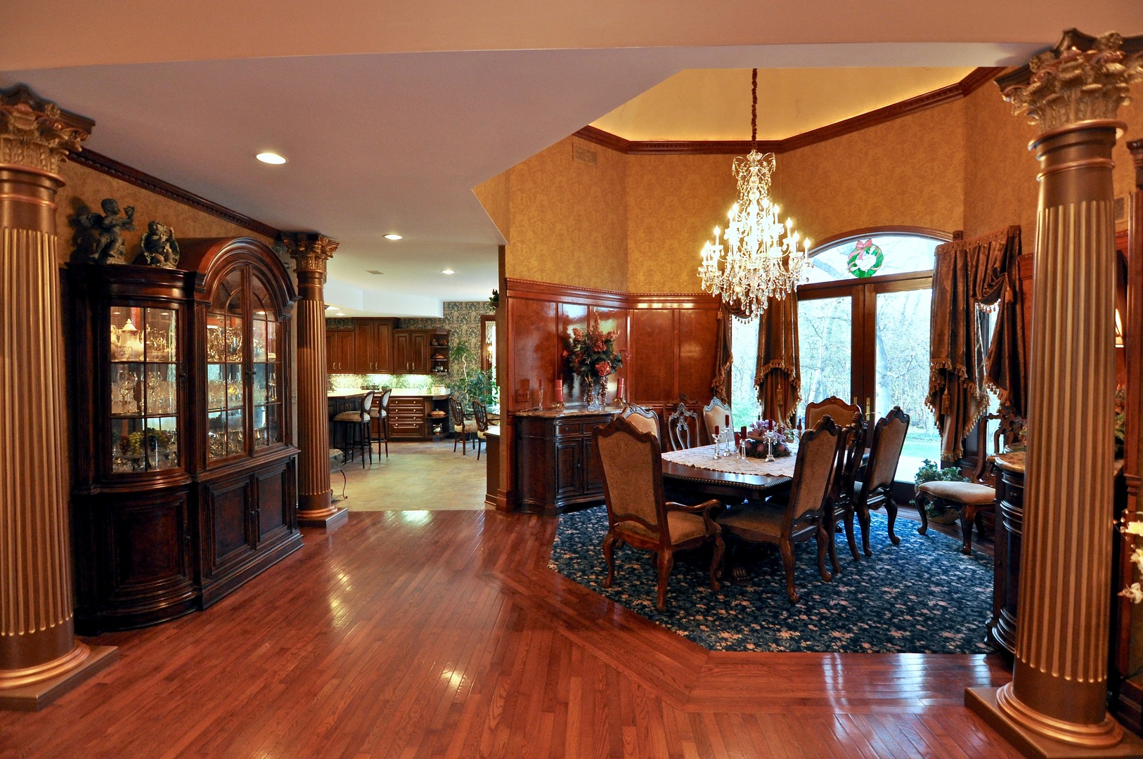 16161 Whipple Road Sycamore, IL 60178 - Photo 16 of 45 a dining room with wooden floor a glass table and chairs