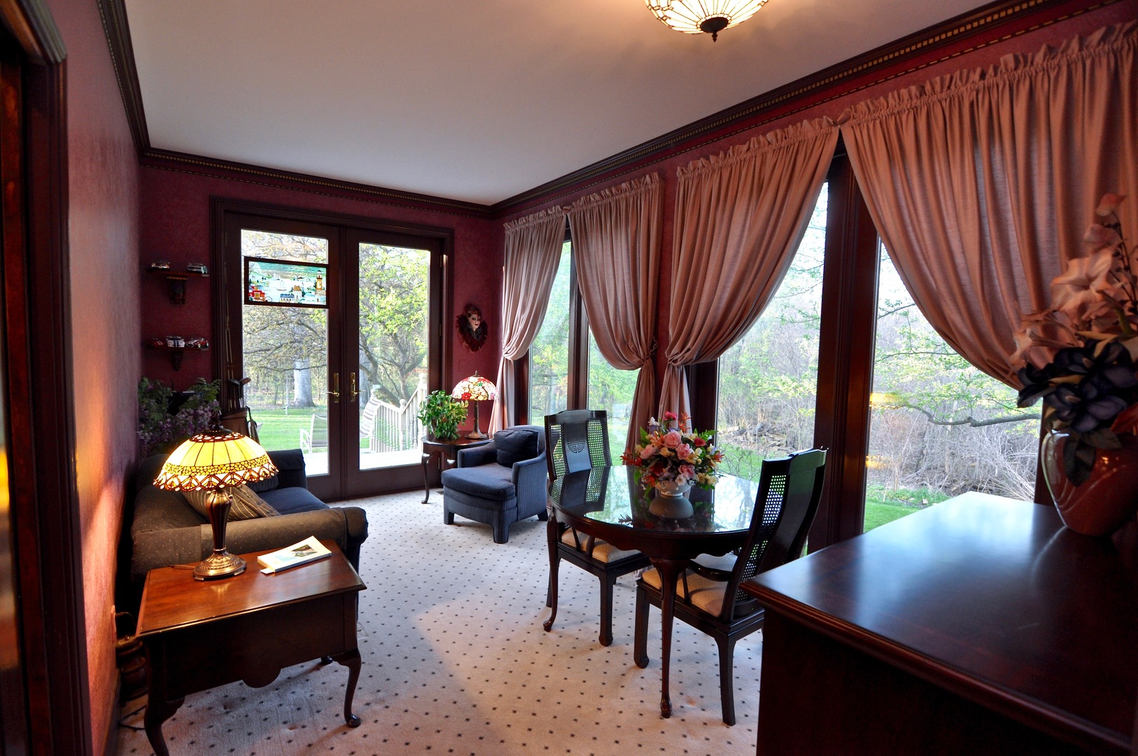 16161 Whipple Road Sycamore, IL 60178 - Photo 29 of 45 a living room filled with furniture and a floor to ceiling window