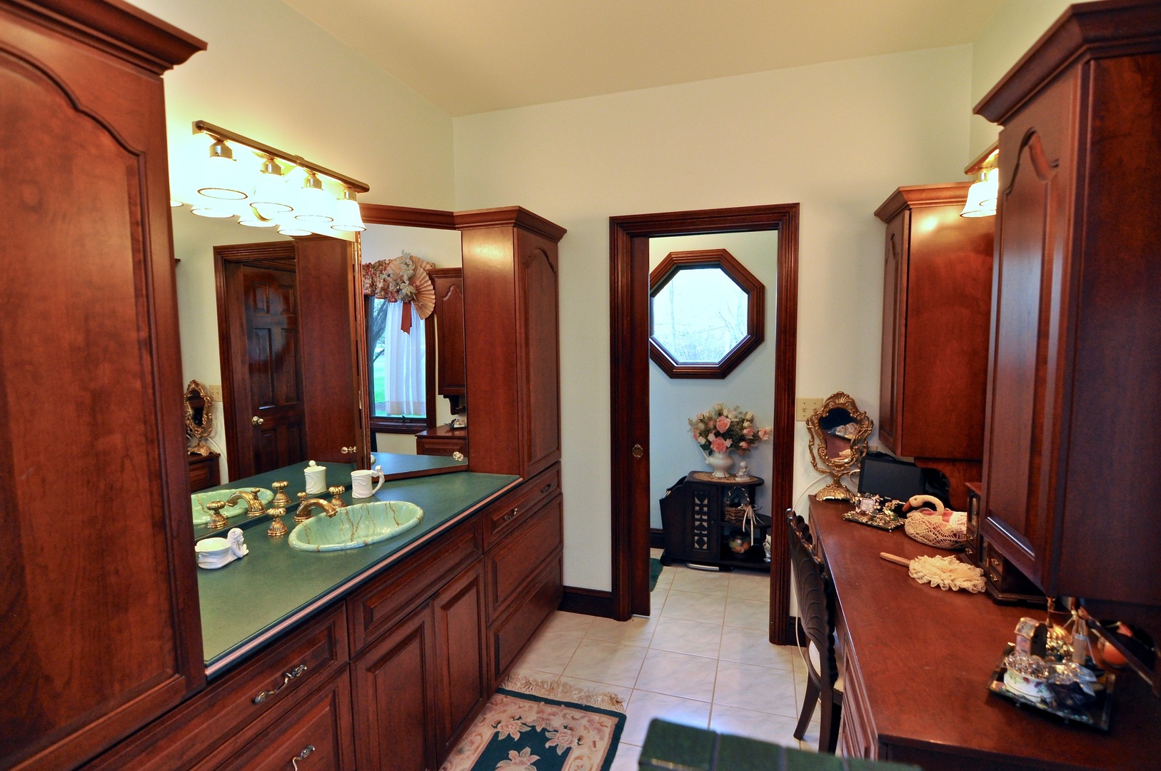 16161 Whipple Road Sycamore, IL 60178 - Photo 30 of 45 a bathroom with a sink mirror and vanity