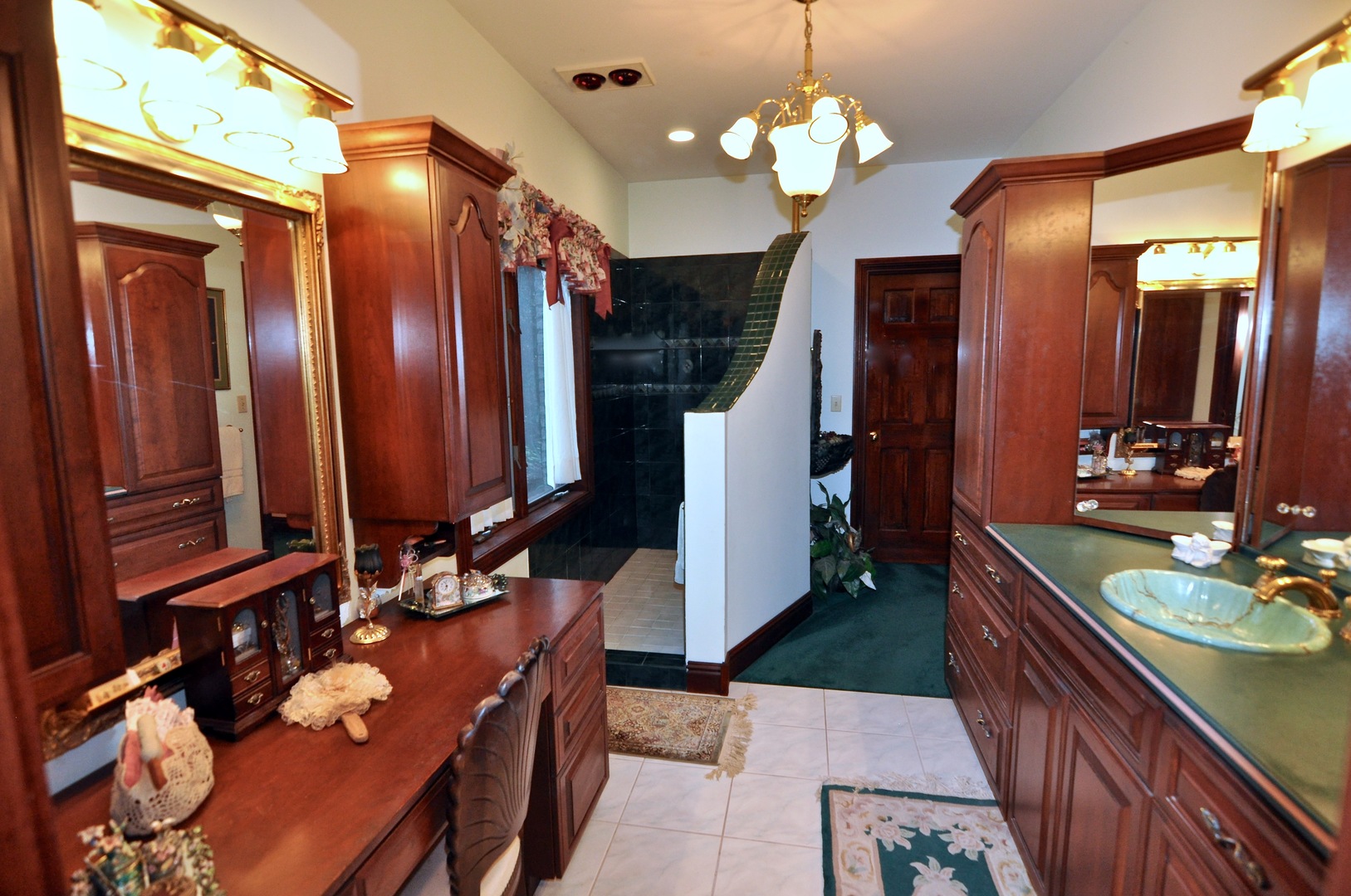 16161 Whipple Road Sycamore, IL 60178 - Photo 31 of 45 a bathroom with a double vanity sink and a mirror