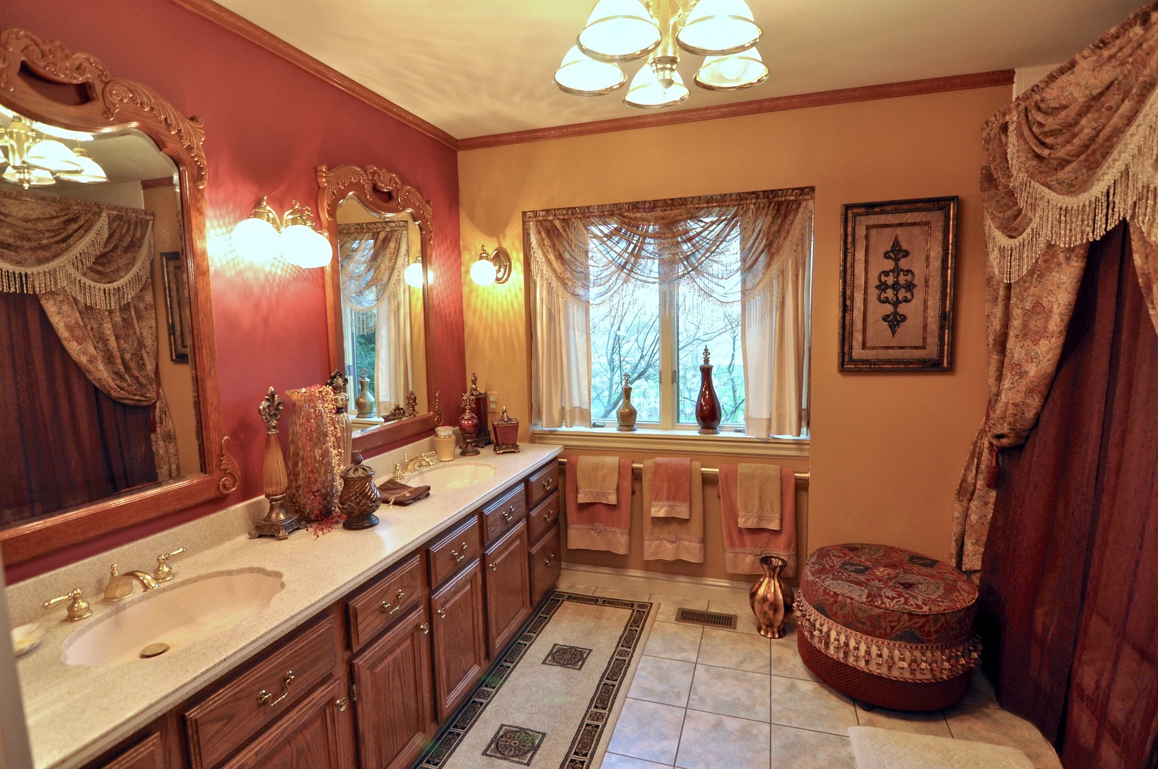 16161 Whipple Road Sycamore, IL 60178 - Photo 34 of 45 a bathroom with a double vanity sink a toilet and a mirror