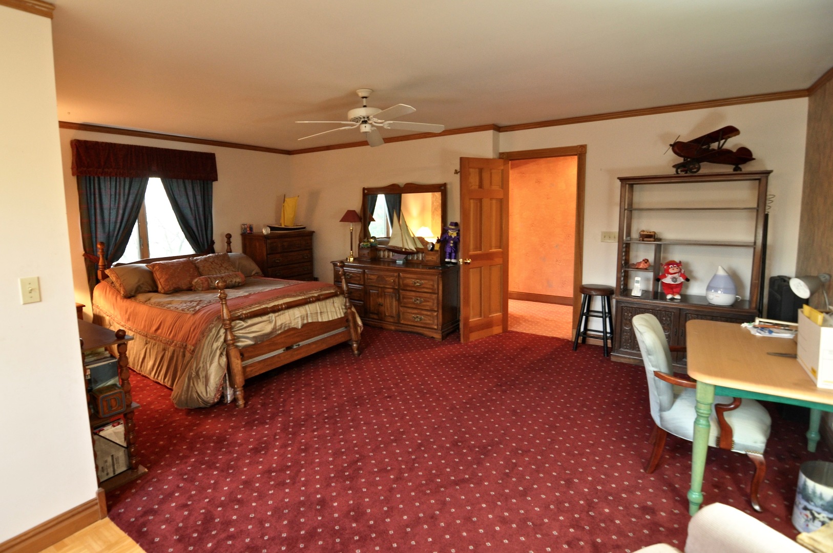 16161 Whipple Road Sycamore, IL 60178 - Photo 36 of 45 a bedroom with furniture and a window