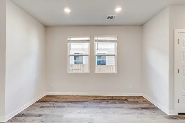 an empty room with window