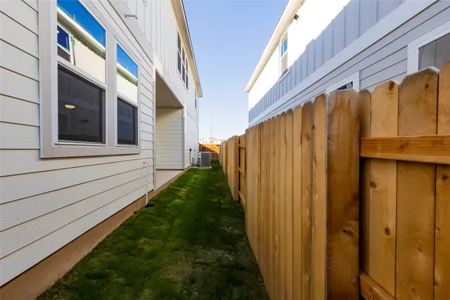 a view of a back yard of the house