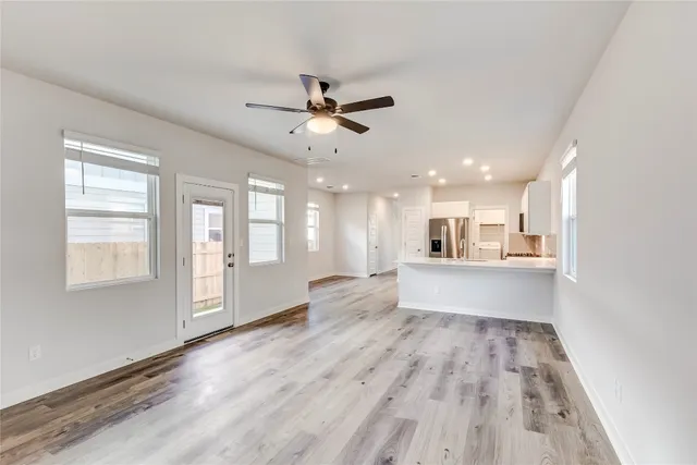 a view of an empty room and window