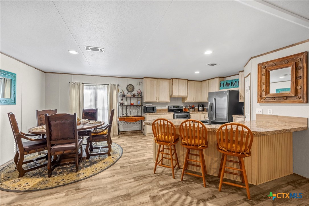 300 Private Road 3221 Kempner, TX 76539 - Photo 12 of 32 a view of a dining room with furniture