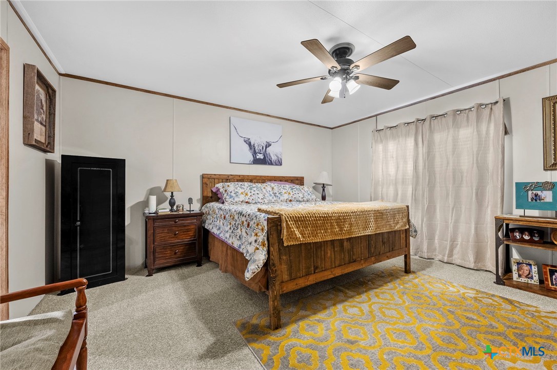 300 Private Road 3221 Kempner, TX 76539 - Photo 20 of 32 a bedroom with a bed and window