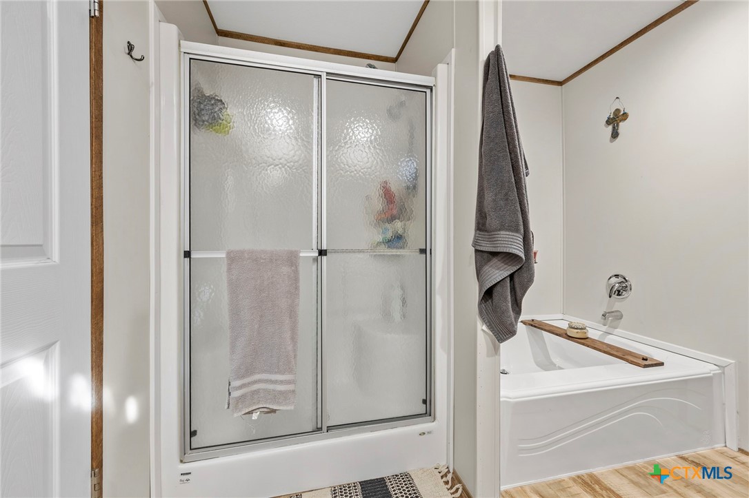 300 Private Road 3221 Kempner, TX 76539 - Photo 24 of 32 a bathroom with a shower and a glass door