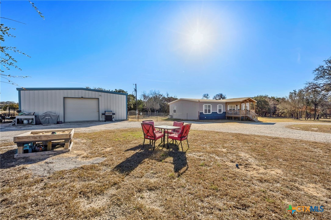 300 Private Road 3221 Kempner, TX 76539 - Photo 26 of 32 a view of a swimming pool with a lounge chairs