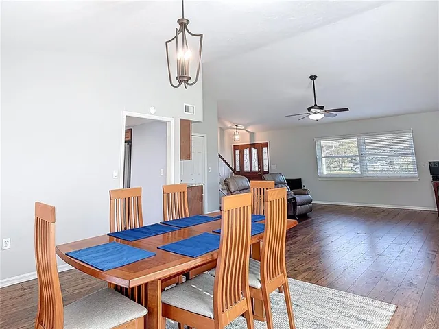 a kitchen with stainless steel appliances a sink stove and refrigerator