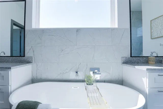 a bathroom with a sink and toilet