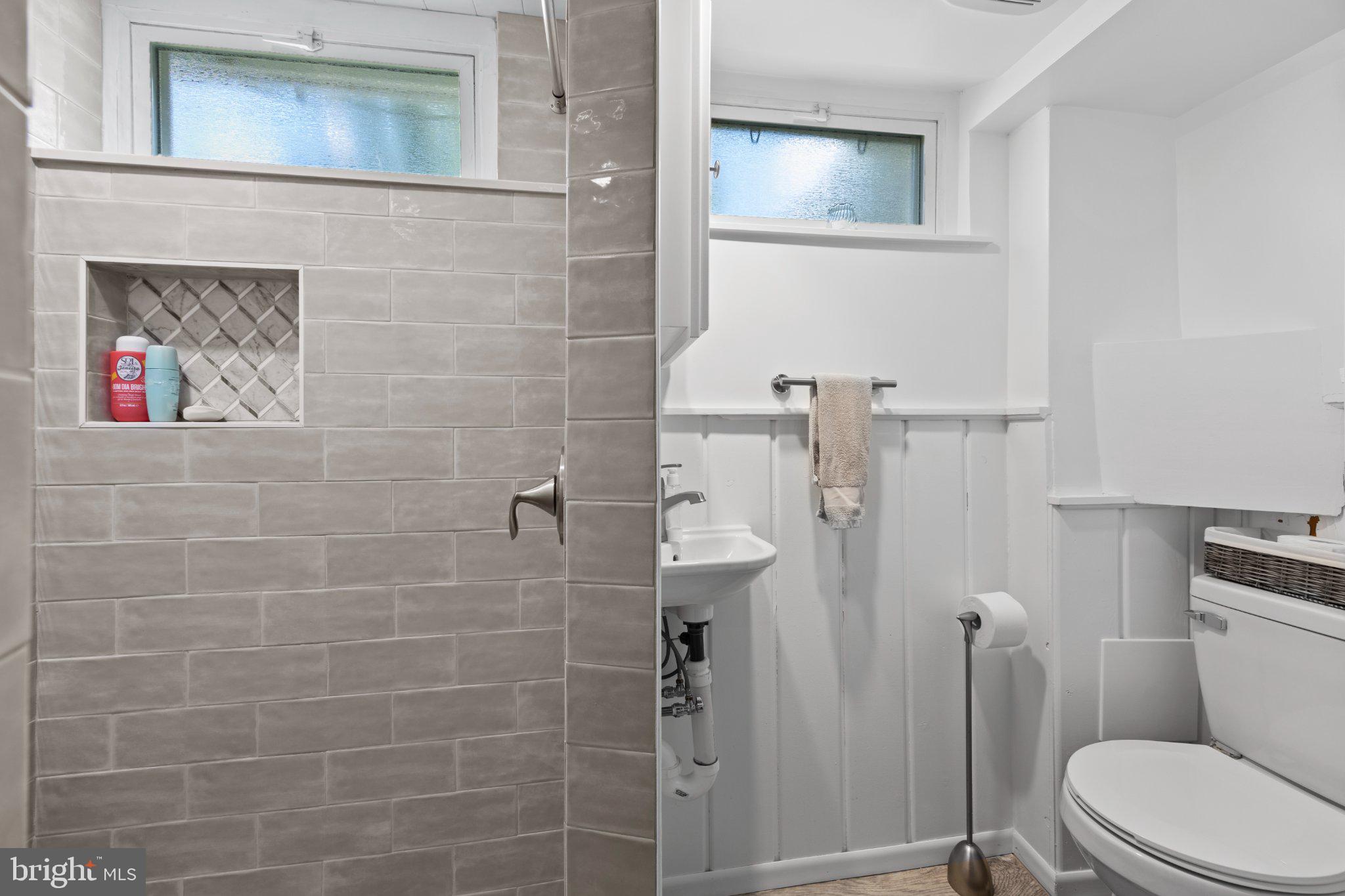 6705 New Hope Drive Springfield, VA 22151 - Photo 48 of 67 Modern bathroom with sleek design.