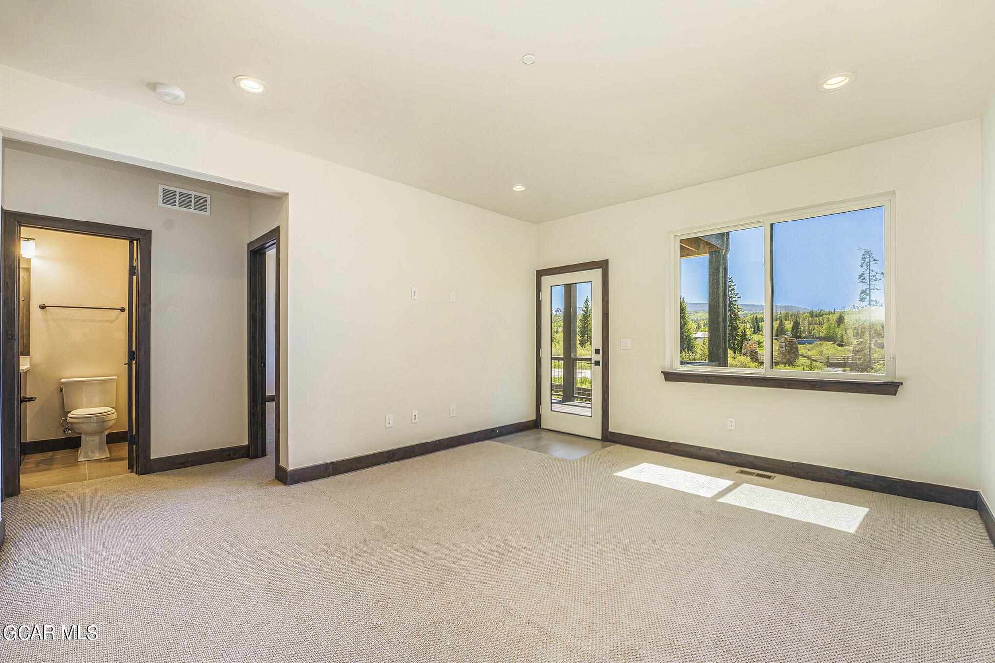 145 Homestead Loop Fraser, CO 80442 - Photo 14 of 22 a view of an empty room with a window