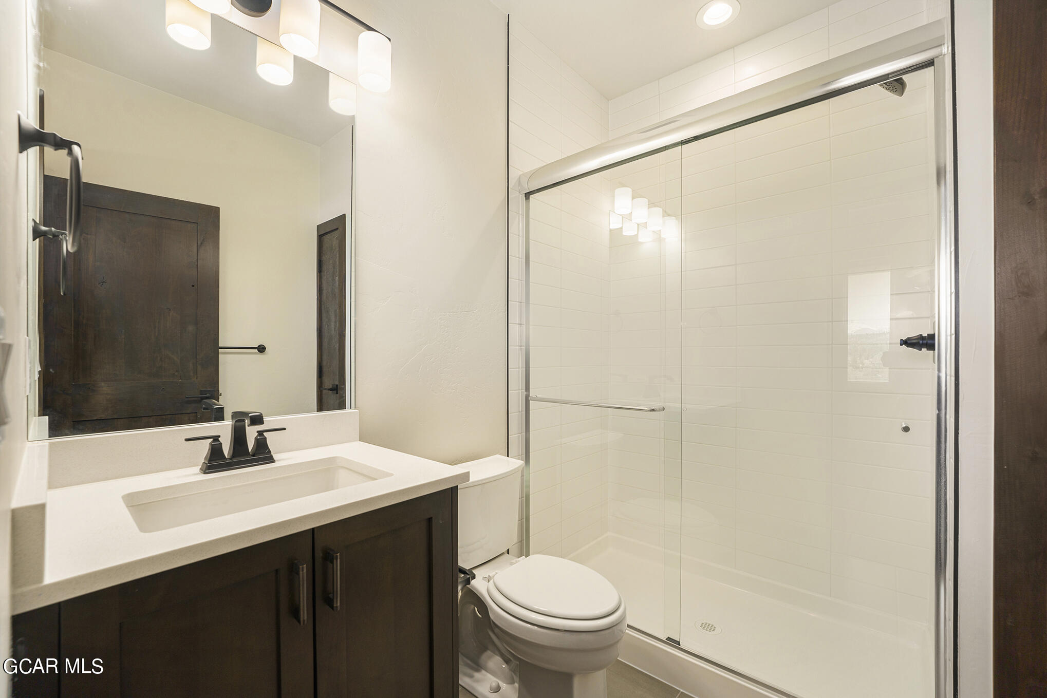 145 Homestead Loop Fraser, CO 80442 - Photo 17 of 22 a bathroom with a sink toilet and shower