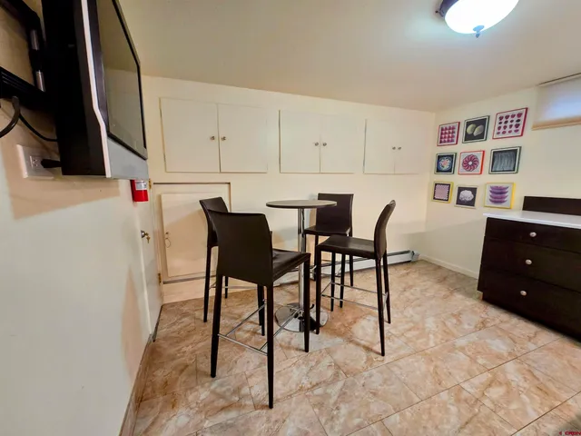 a room with furniture and cabinets