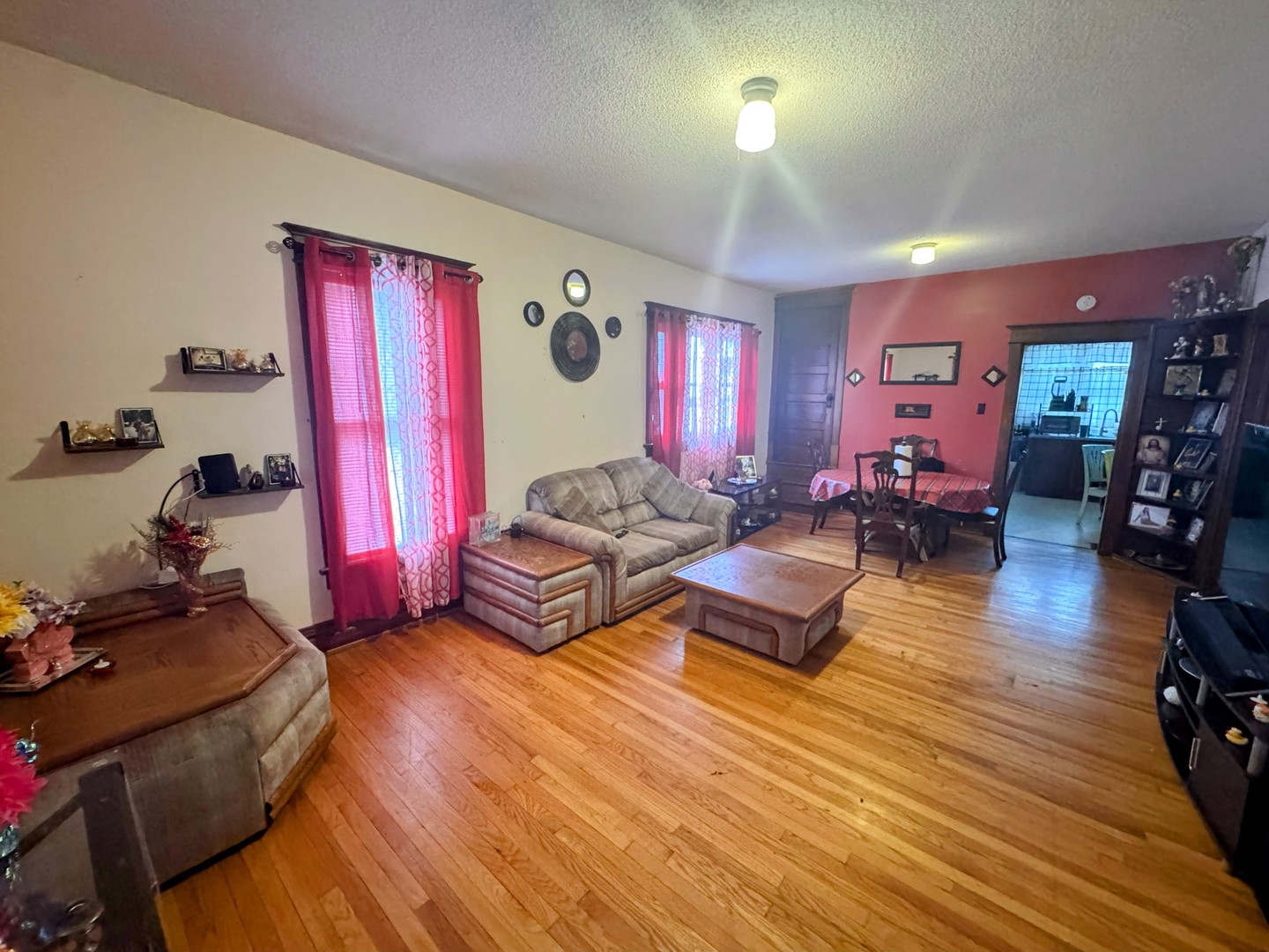 506 South Beech Street Arthur, IL 61911 - Photo 3 of 7 a living room with furniture and a wooden floor
