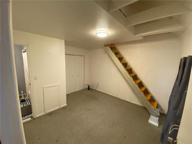 423 Edith Street Pittsburgh, PA 15211 - Photo 18 of 21 Second bedroom- Neutral and large closet as well.