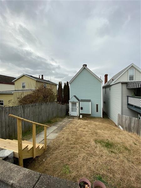 423 Edith Street Pittsburgh, PA 15211 - Photo 21 of 21 Nice Yard and new steps off of the off street parking area.
