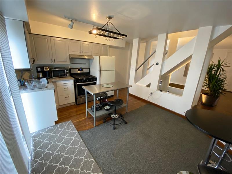 423 Edith Street Pittsburgh, PA 15211 - Photo 5 of 21 Equipped Kitchen and Stainless Island.