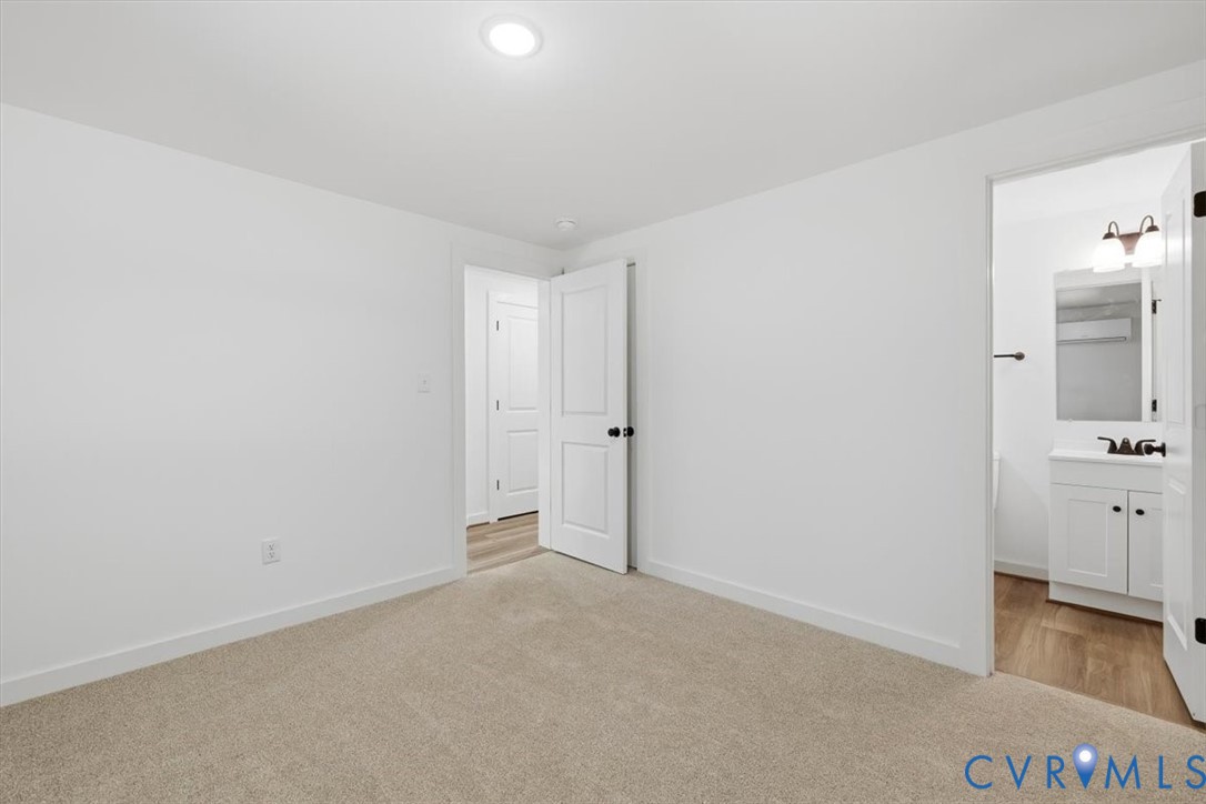 15221 Wright Road Amelia Court House, VA 23002 - Photo 18 of 22 Neutral-toned carpeted room featuring a ceiling-mo
