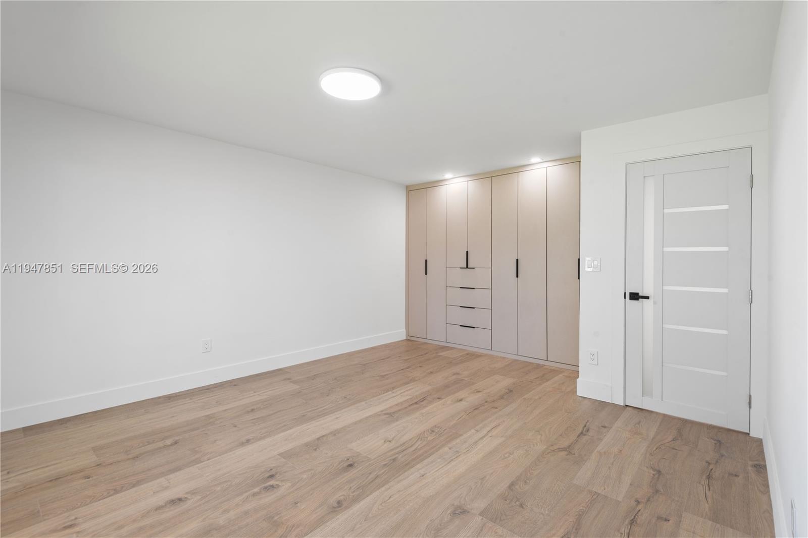 8420 Southwest 179th Street Palmetto Bay, FL 33157 - Photo 13 of 27 a view of an empty room