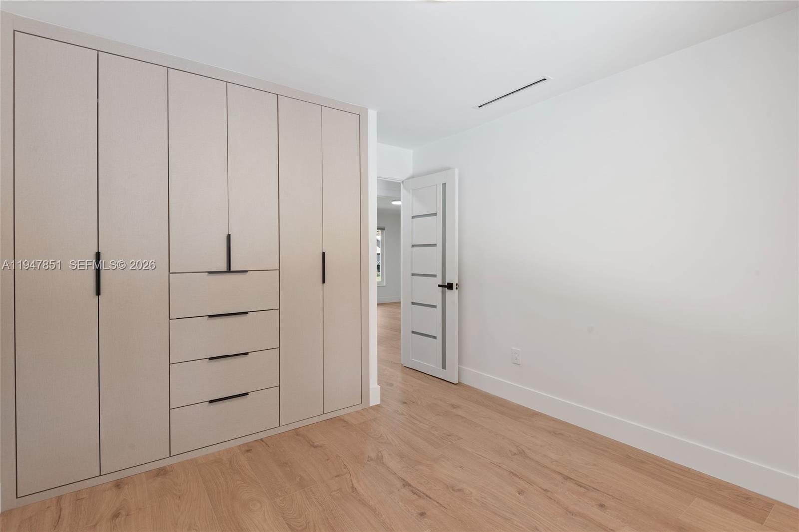 8420 Southwest 179th Street Palmetto Bay, FL 33157 - Photo 17 of 27 a view of an empty room