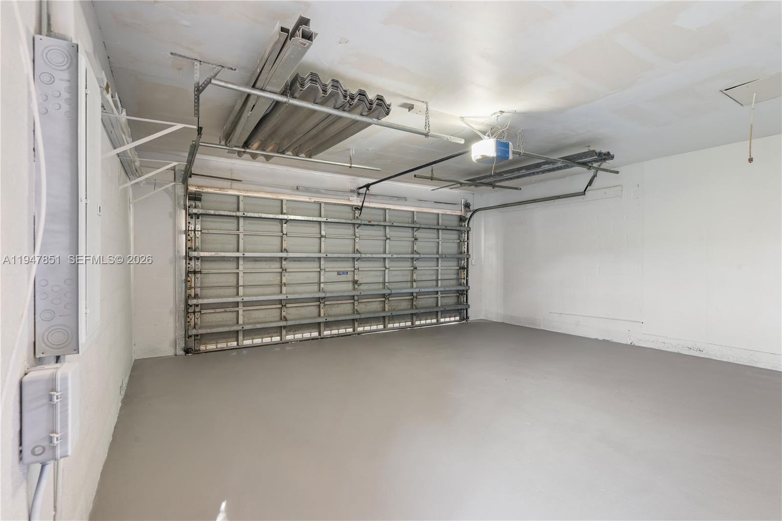 8420 Southwest 179th Street Palmetto Bay, FL 33157 - Photo 23 of 27 a view of a garage