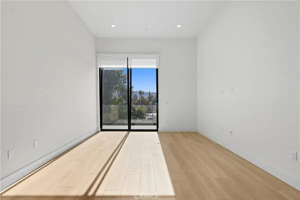 an empty room with entrance door