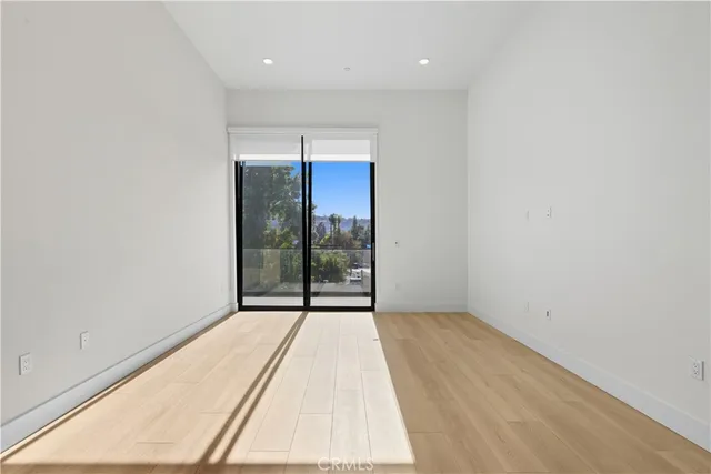 an empty room with entrance door