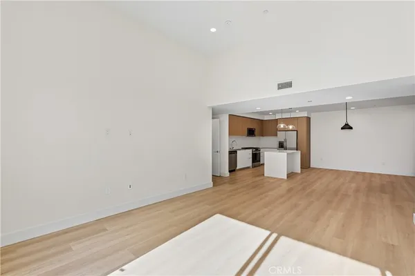 a view of a kitchen with a sink