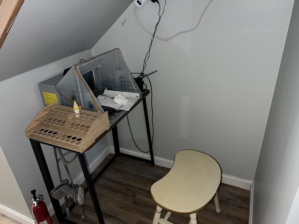 39 Mill Road Chelmsford, MA 01824 - Photo 15 of 22 a bathroom with a sink mirror and toilet